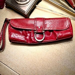 SASSY APT 9 snakeprint wristlet/clutch.